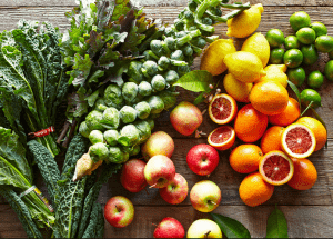 a group of fruits and vegetables on a wood surface Healthy Weight Loss Diets Skelmersdale