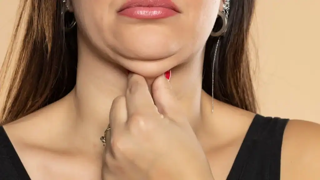 An image of a woman with double chin, sad, worried : Non Surgical Double Chin Removal Treatment in Skelmersdale, UK